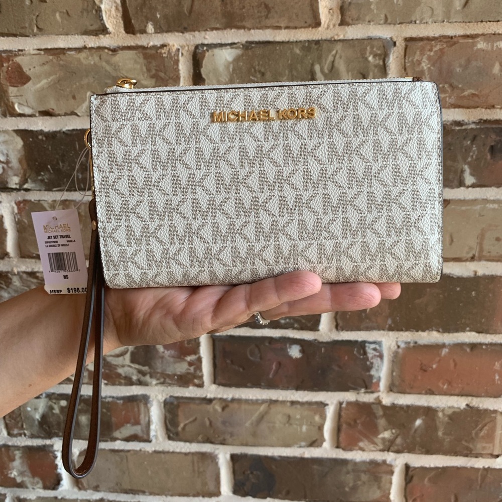 Michael Kors Double Zip Wristlet wallet vanilla acorn has detachable strap.